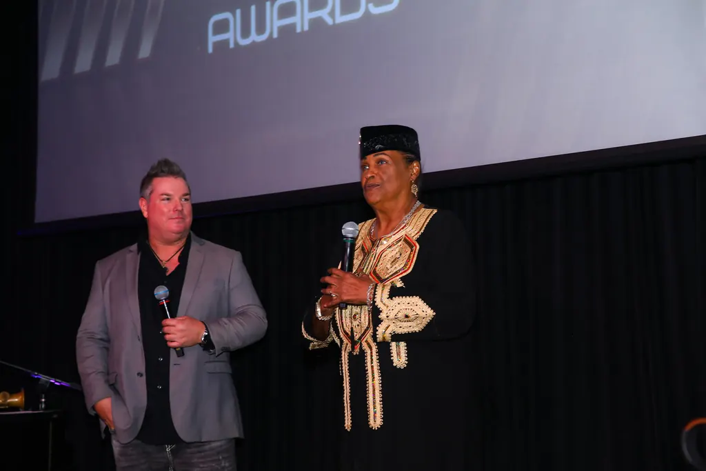 Master of ceremonies hosting the Be Great! Awards
