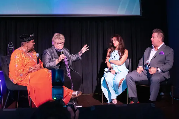 Panel discussion on stage at the Be Great! Summit